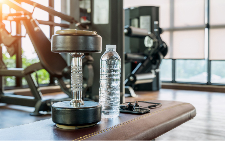 home-gym-dumbbells-and-water-bottle